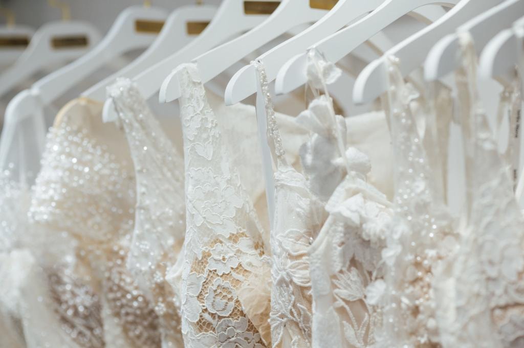 Gown preservation specialist carefully handling a wedding dress